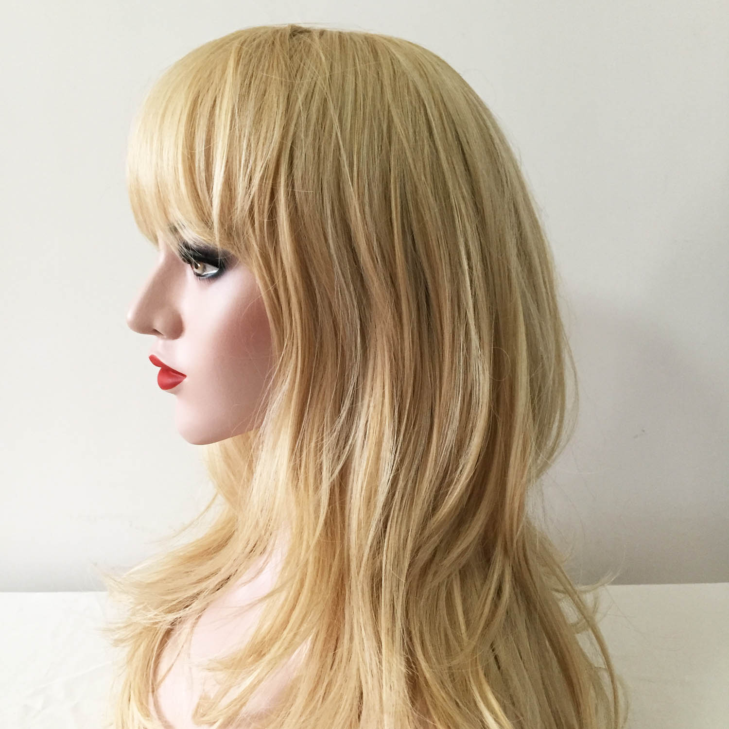 nevermindyrhead Women Blonde Long Wavy Fringe Bangs Layered Wig