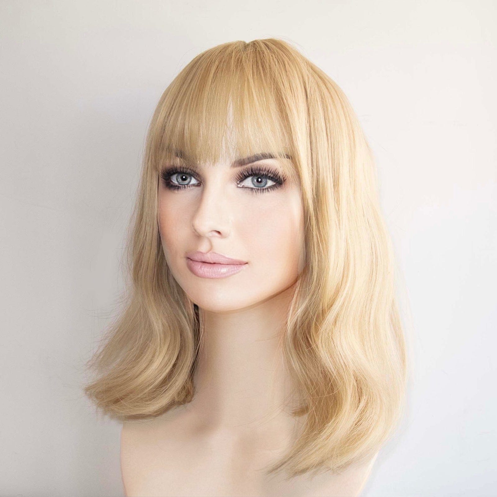 nevermindyrhead Women Golden Blonde Long Wavy Fringe Bangs Wig