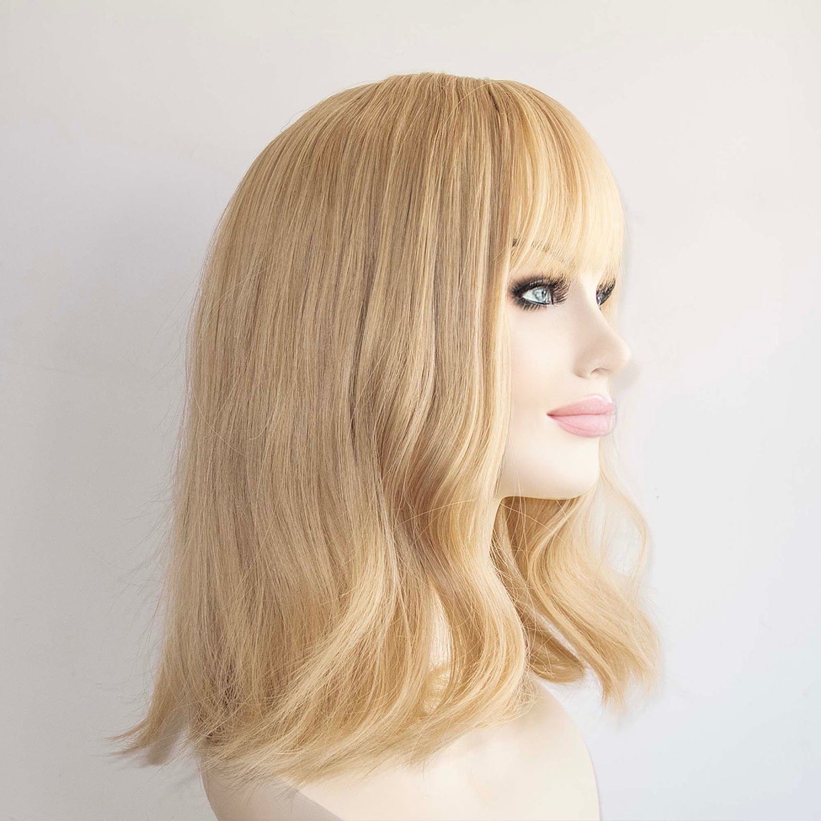 nevermindyrhead Women Golden Blonde Long Wavy Fringe Bangs Wig