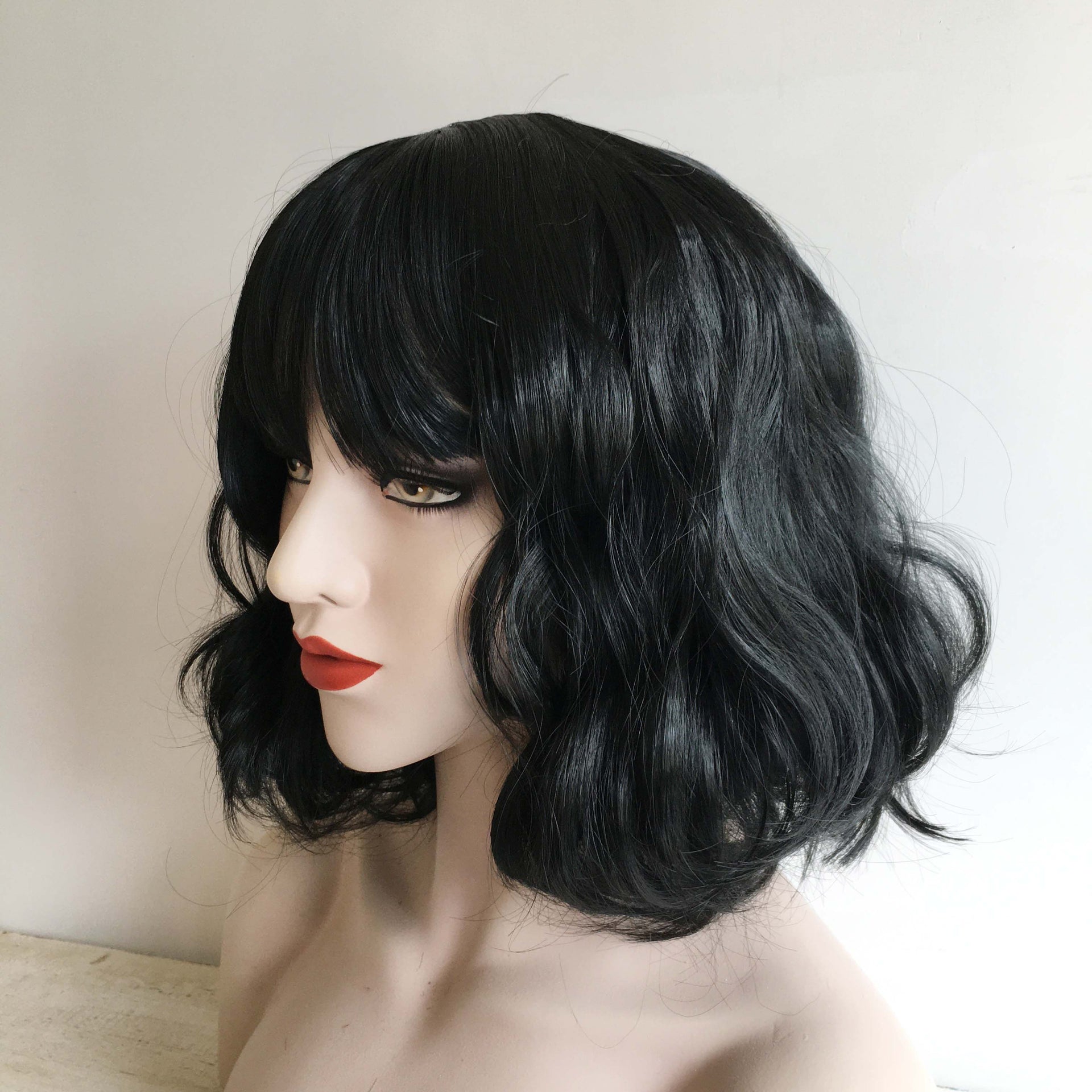 nevermindyrhead Women Black Short Curly Cute Bob Fringe Bangs Wig