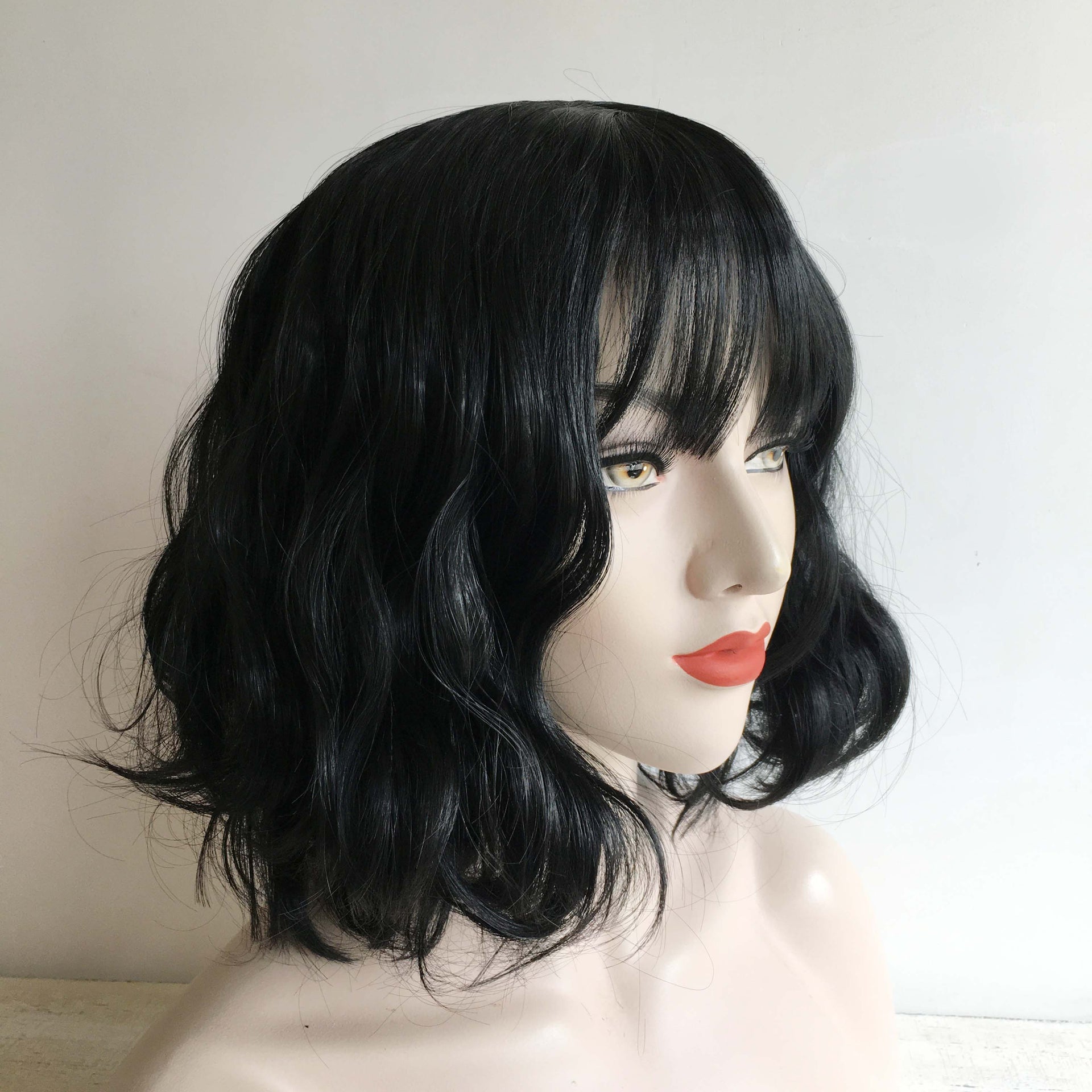 nevermindyrhead Women Black Short Curly Cute Bob Fringe Bangs Wig