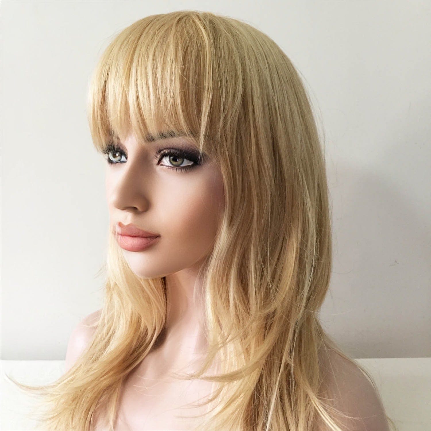 nevermindyrhead Women Blonde Long Wavy Fringe Bangs Layered Wig