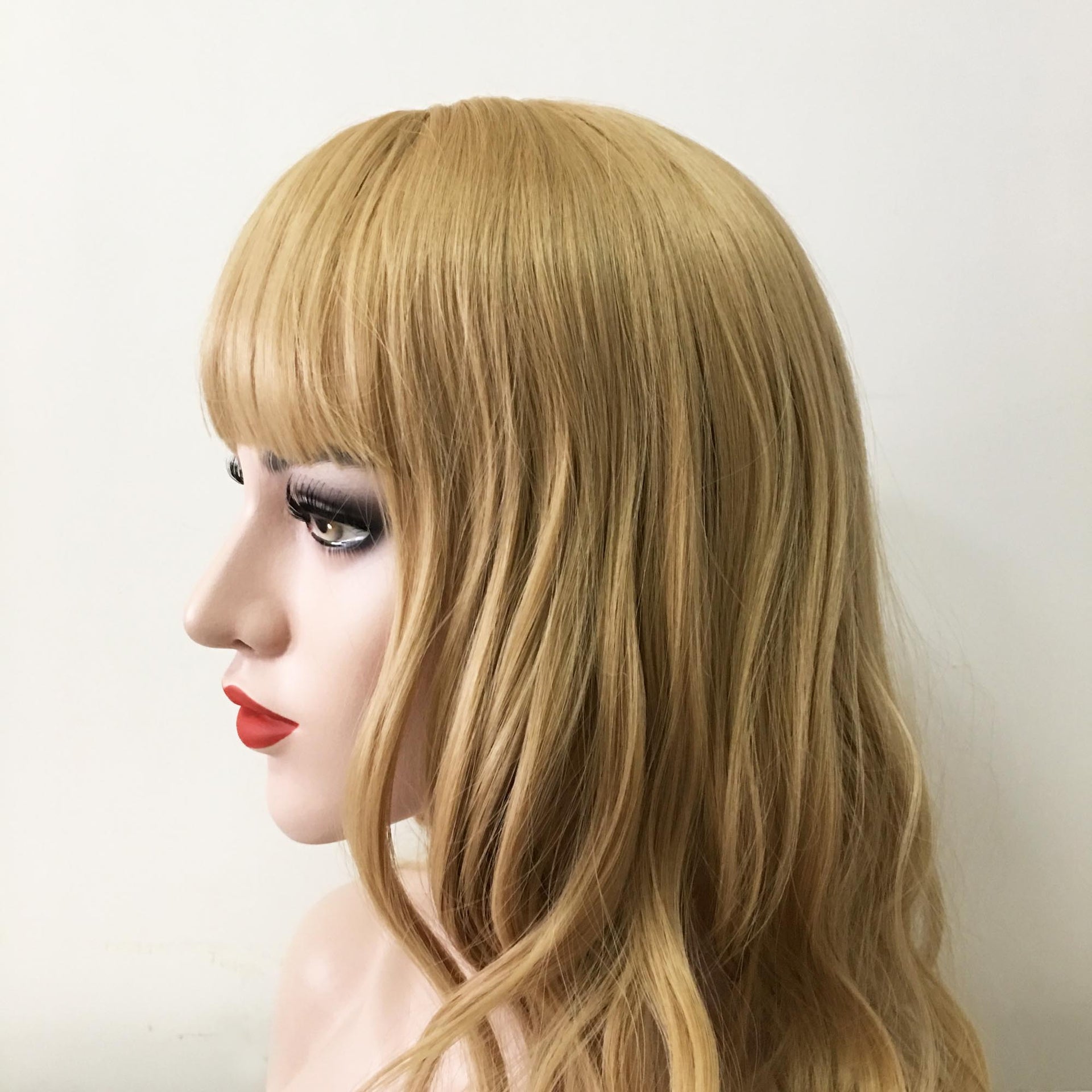 nevermindyrhead Women Blonde Long Curly Blunt Bangs Wig