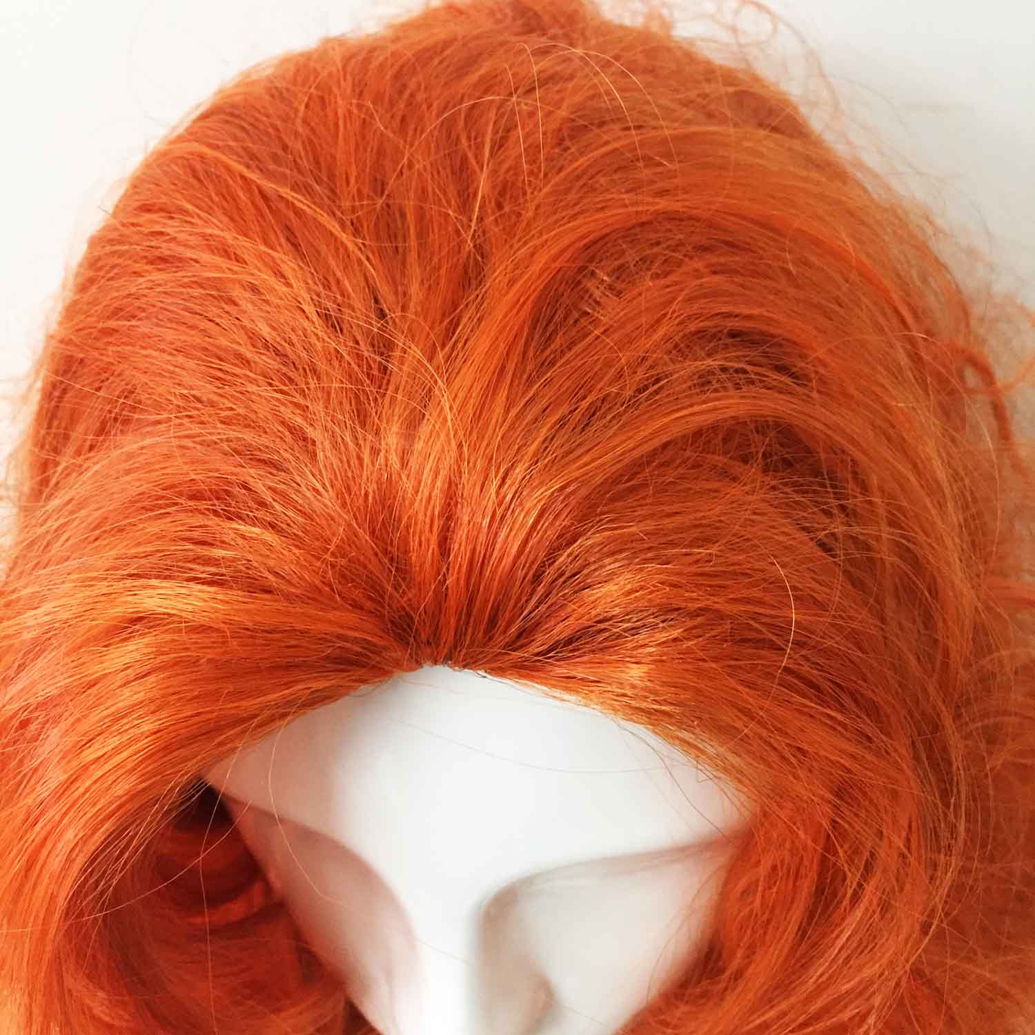 nevermindyrhead Women Orange Long Curly Slicked Back Fluffy Cosplay Wig