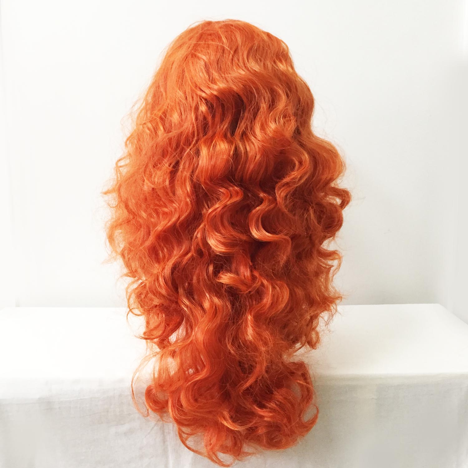 nevermindyrhead Women Orange Long Curly Slicked Back Fluffy Cosplay Wig