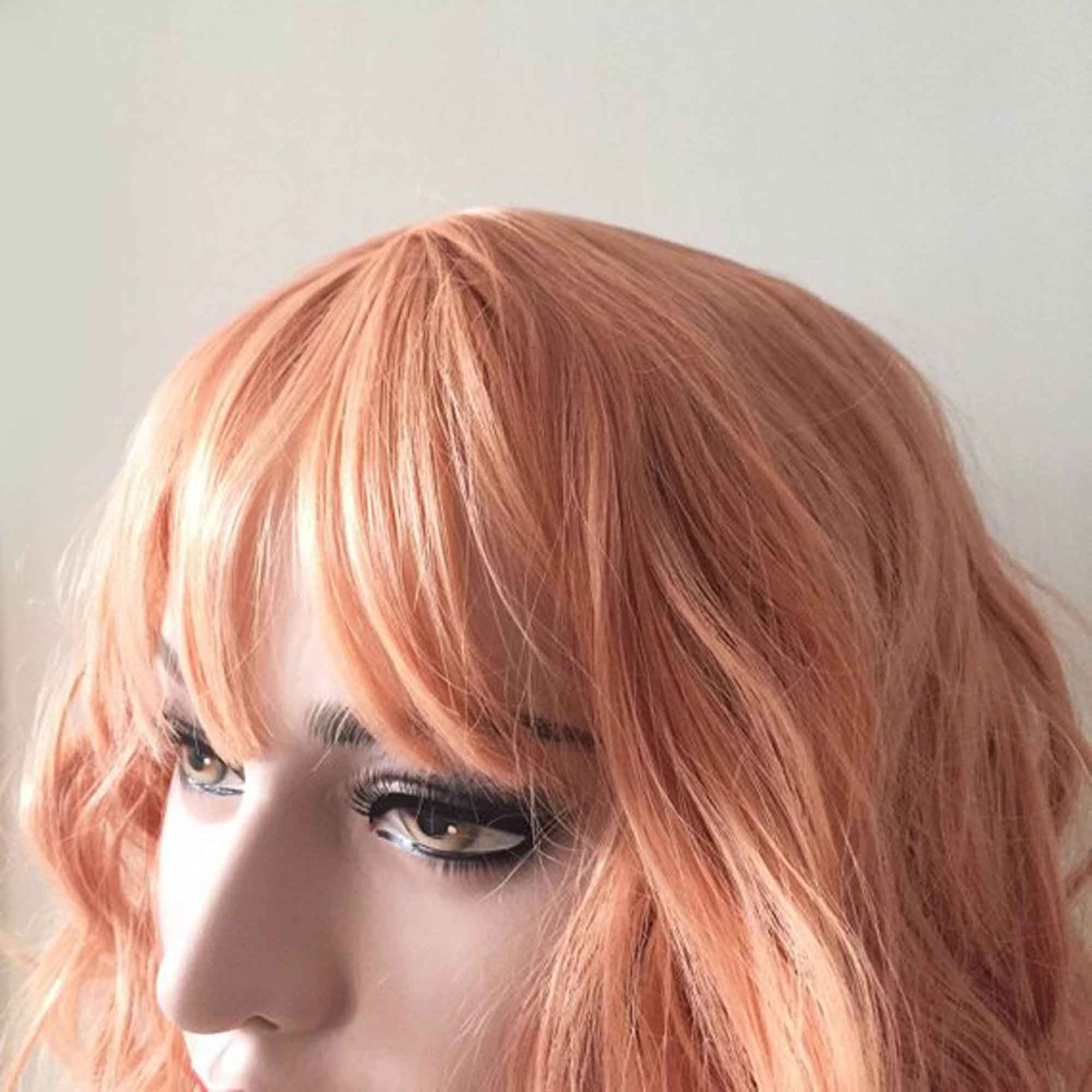 nevermindyrhead Women Orange Short Curly Bob Fringe Bangs Wig