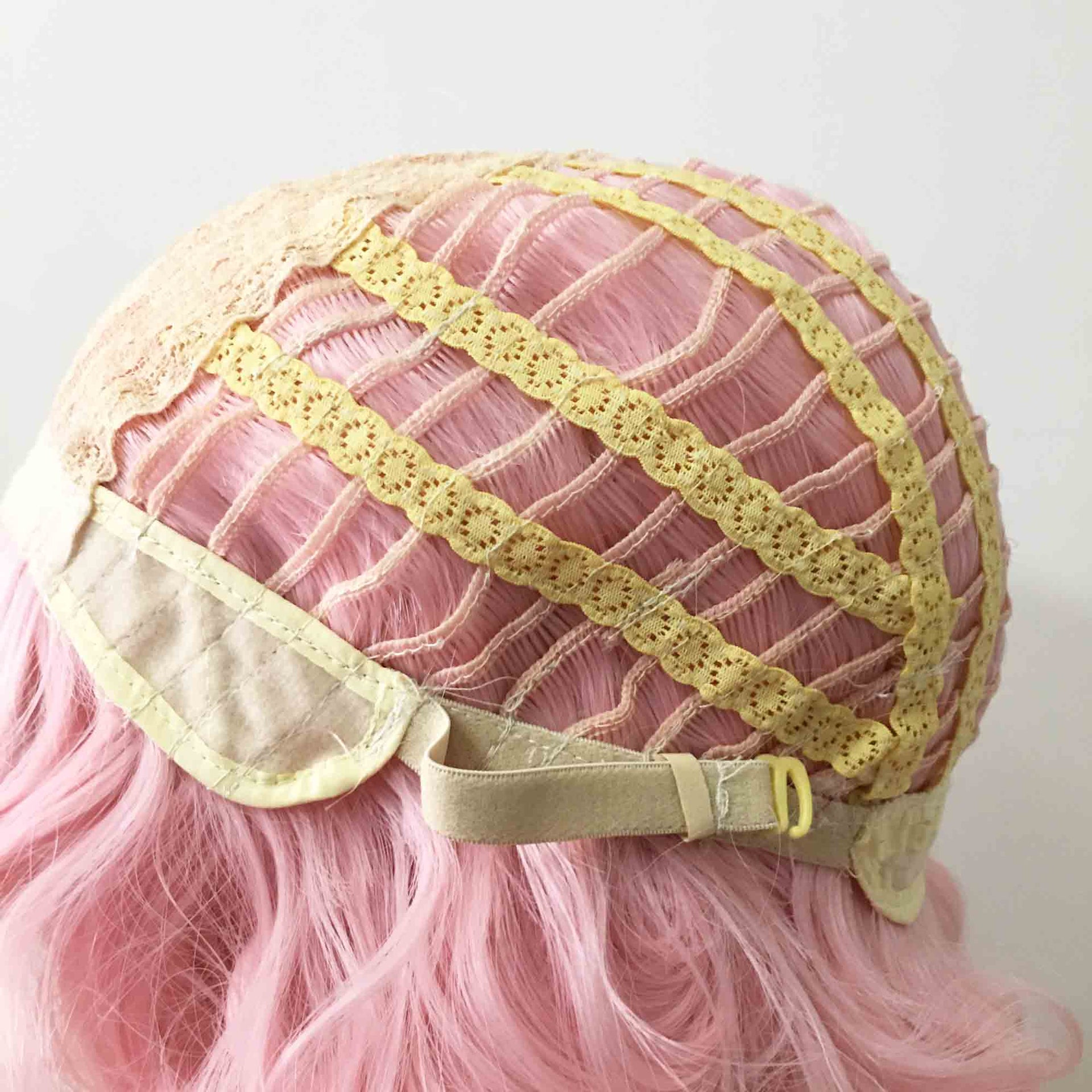 nevermindyrhead Women Pink Short Curly Fringe Bangs Lolita Wig