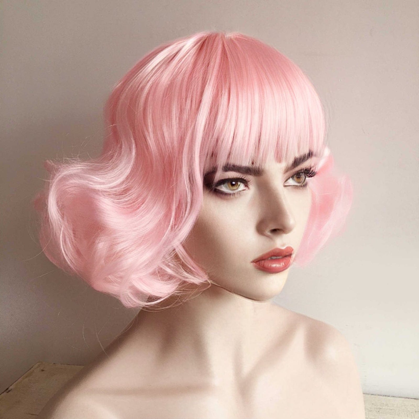 nevermindyrhead Women Pink Short Curly Fringe Bangs Lolita Wig