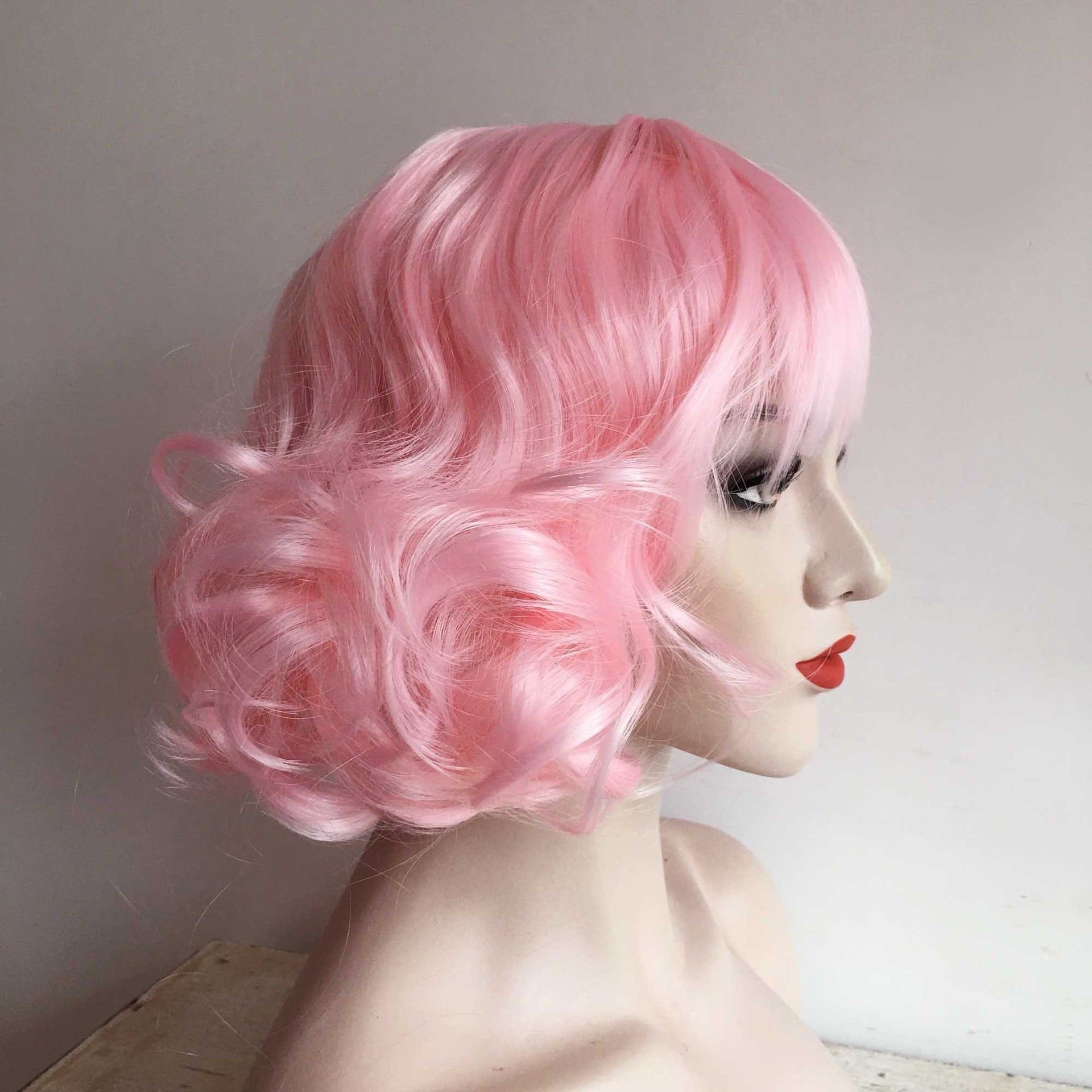 nevermindyrhead Women Pink Short Curly Fringe Bangs Lolita Wig