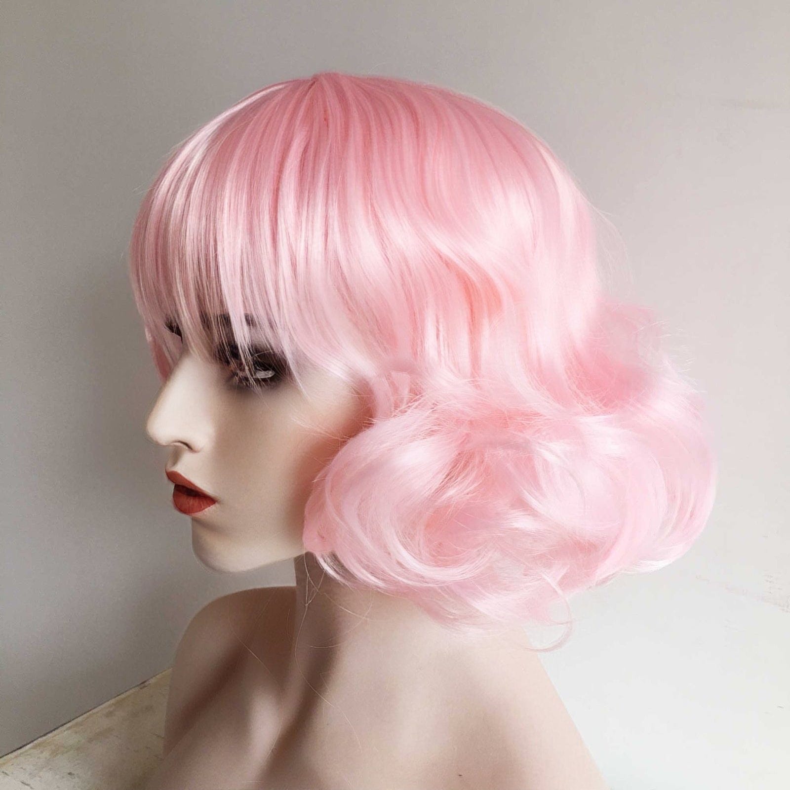 nevermindyrhead Women Pink Short Curly Fringe Bangs Lolita Wig